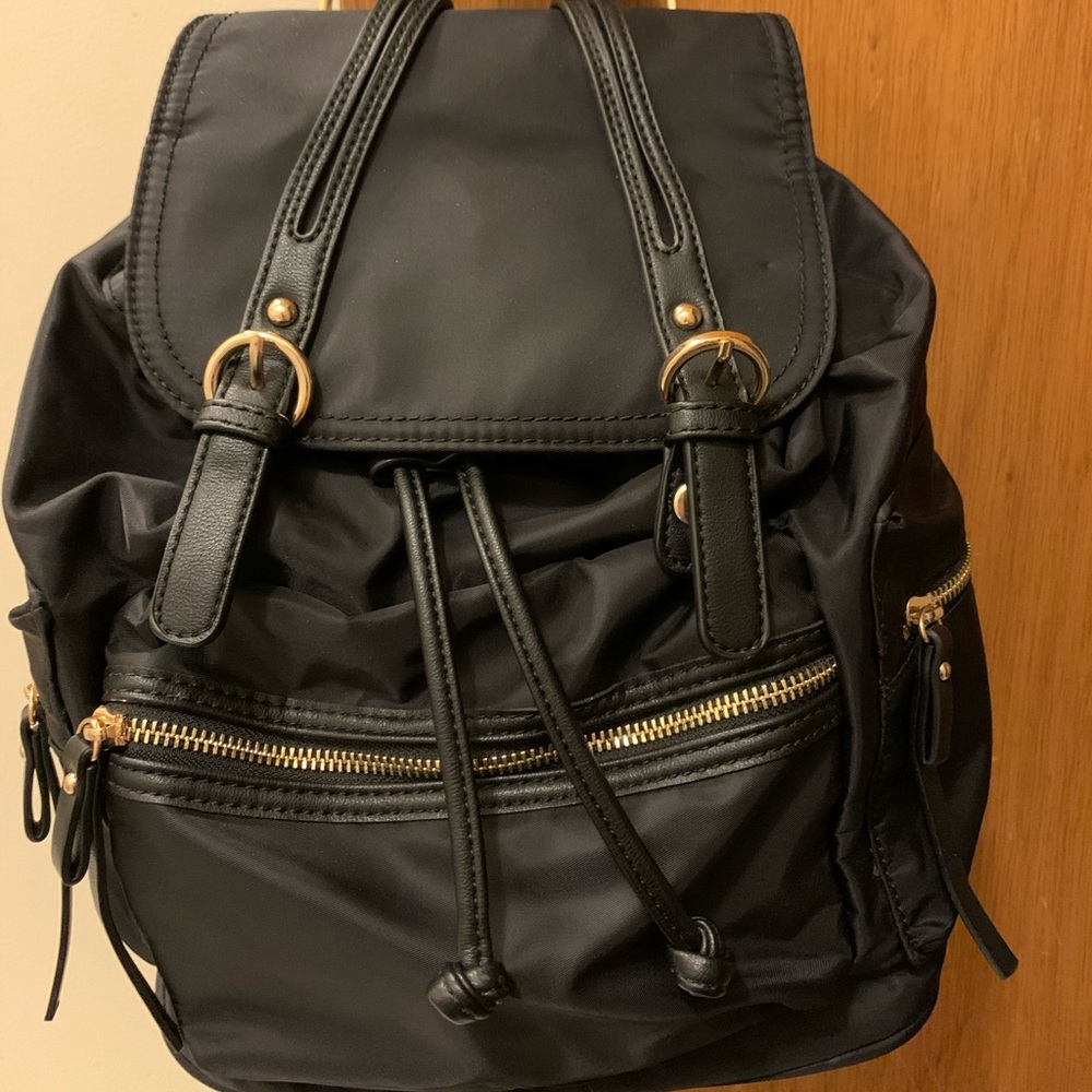 Black leather backpack. Brand new.